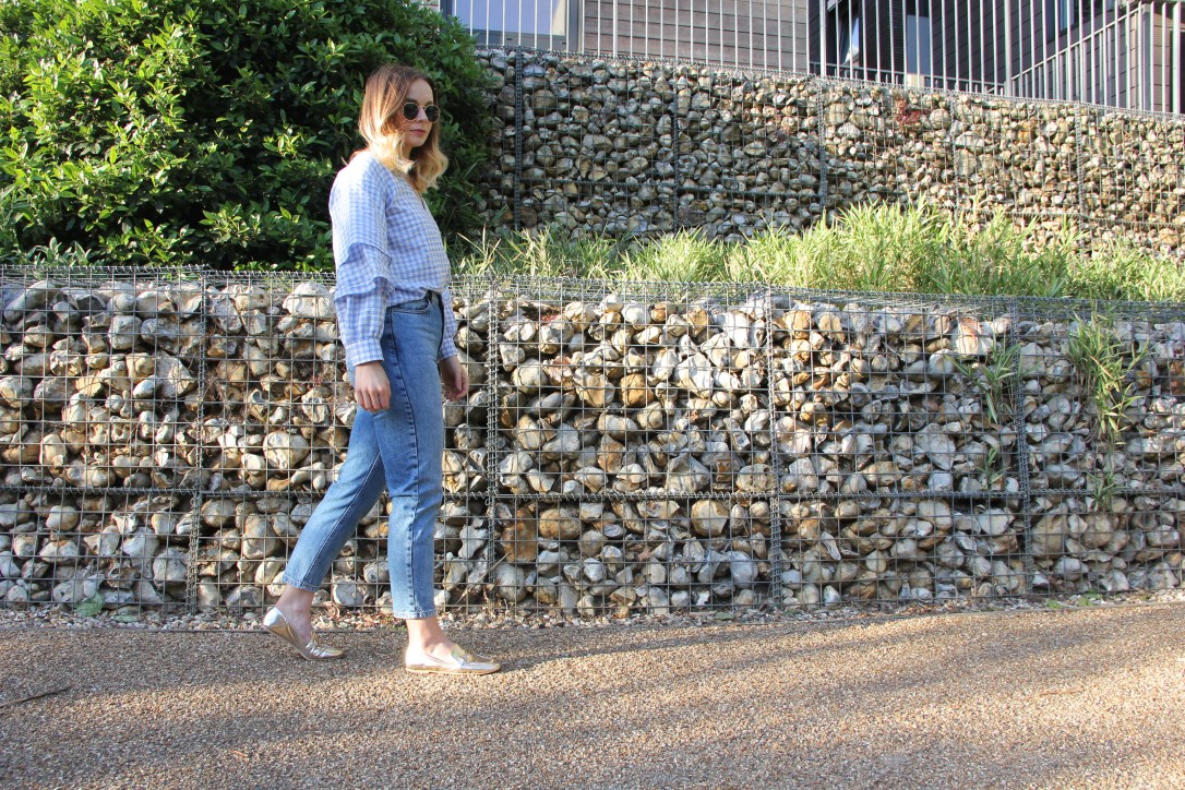 Blue gingham, gold loafers and jeans