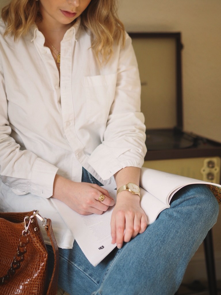 Gold jewellery with an oversized white shirt